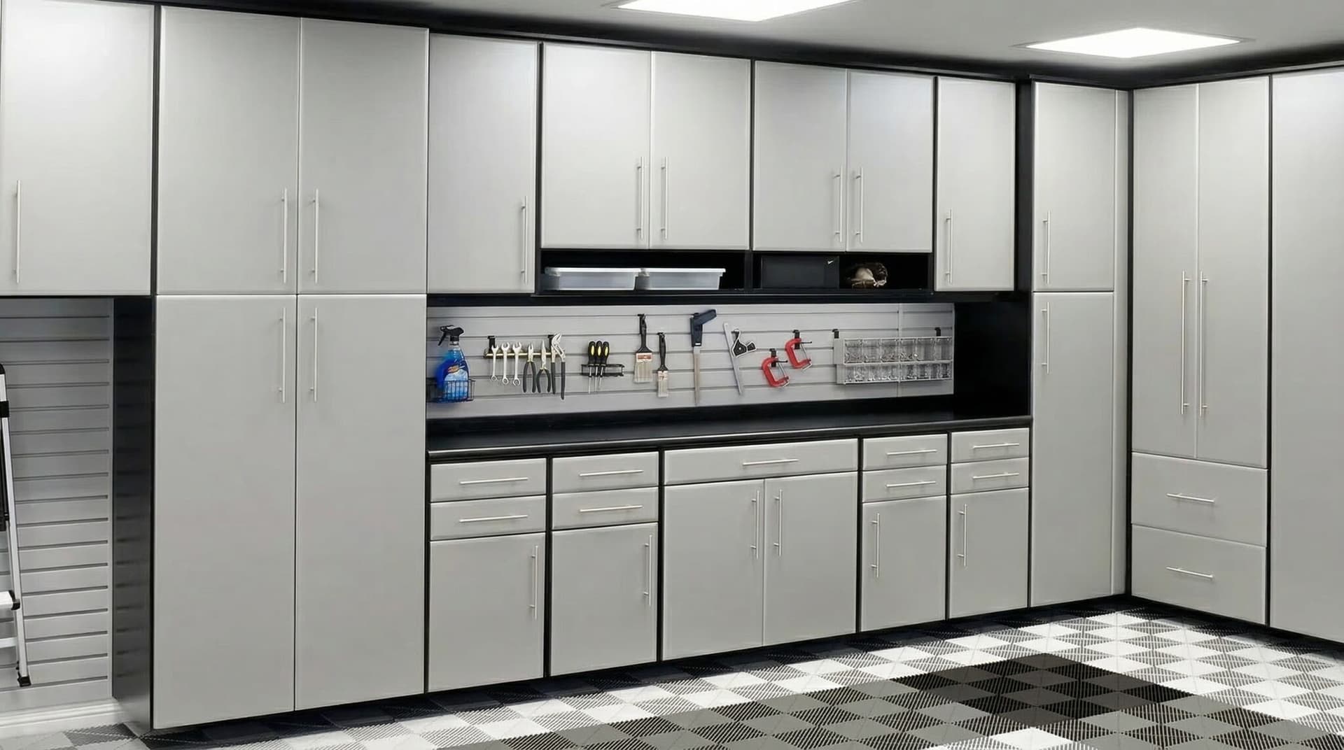 Custom garage storage system with slatwall and workbench